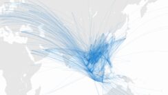 A map centered on Southeast Asia, with arching blue lines visualizing flight routes connecting to other territories.